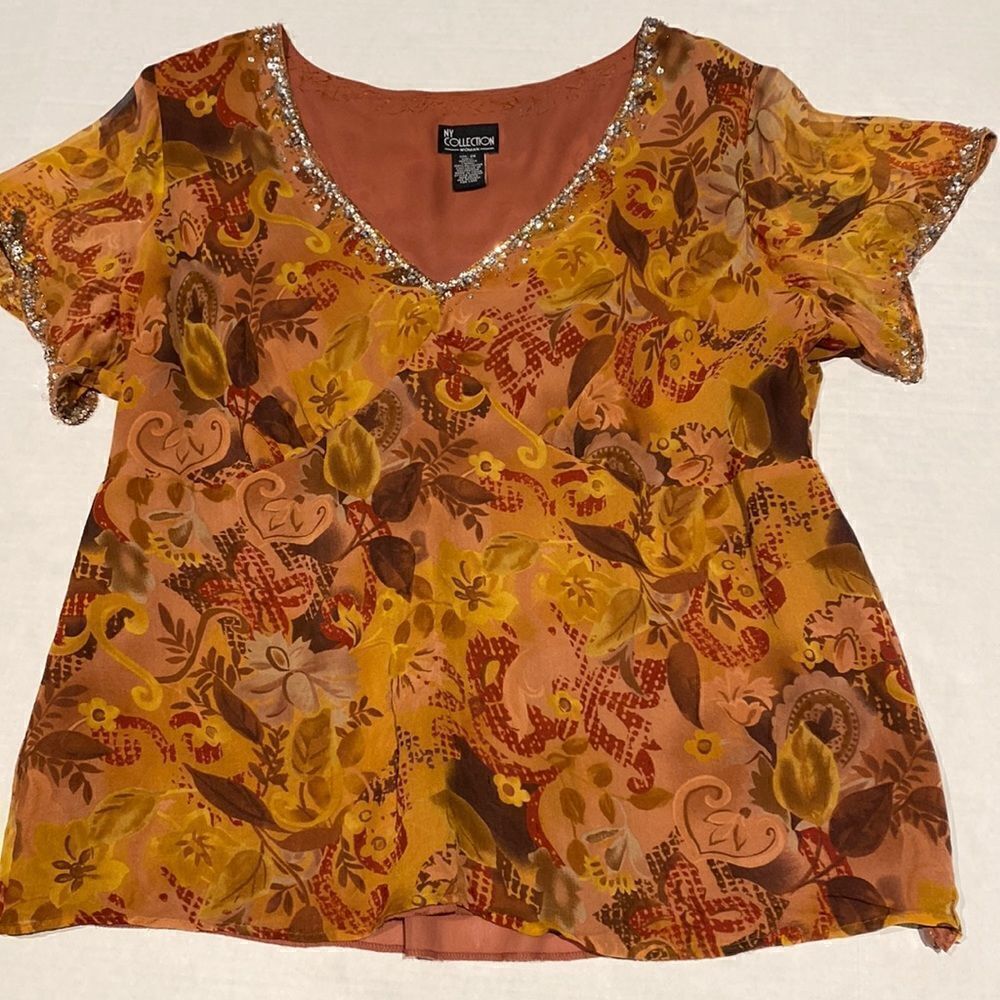 Lite weight flowy short sleeve top with embellished neckline and sleeves size 2X
